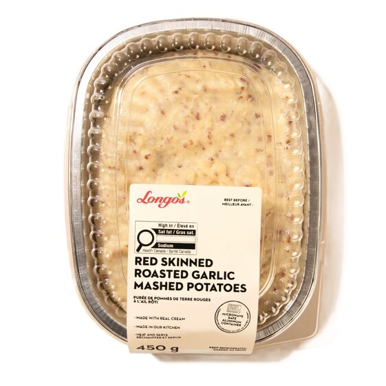 Longo's Red Skinned Roasted Garlic Mashed Potatoes in a 450g ready-to-heat refrigerated container.